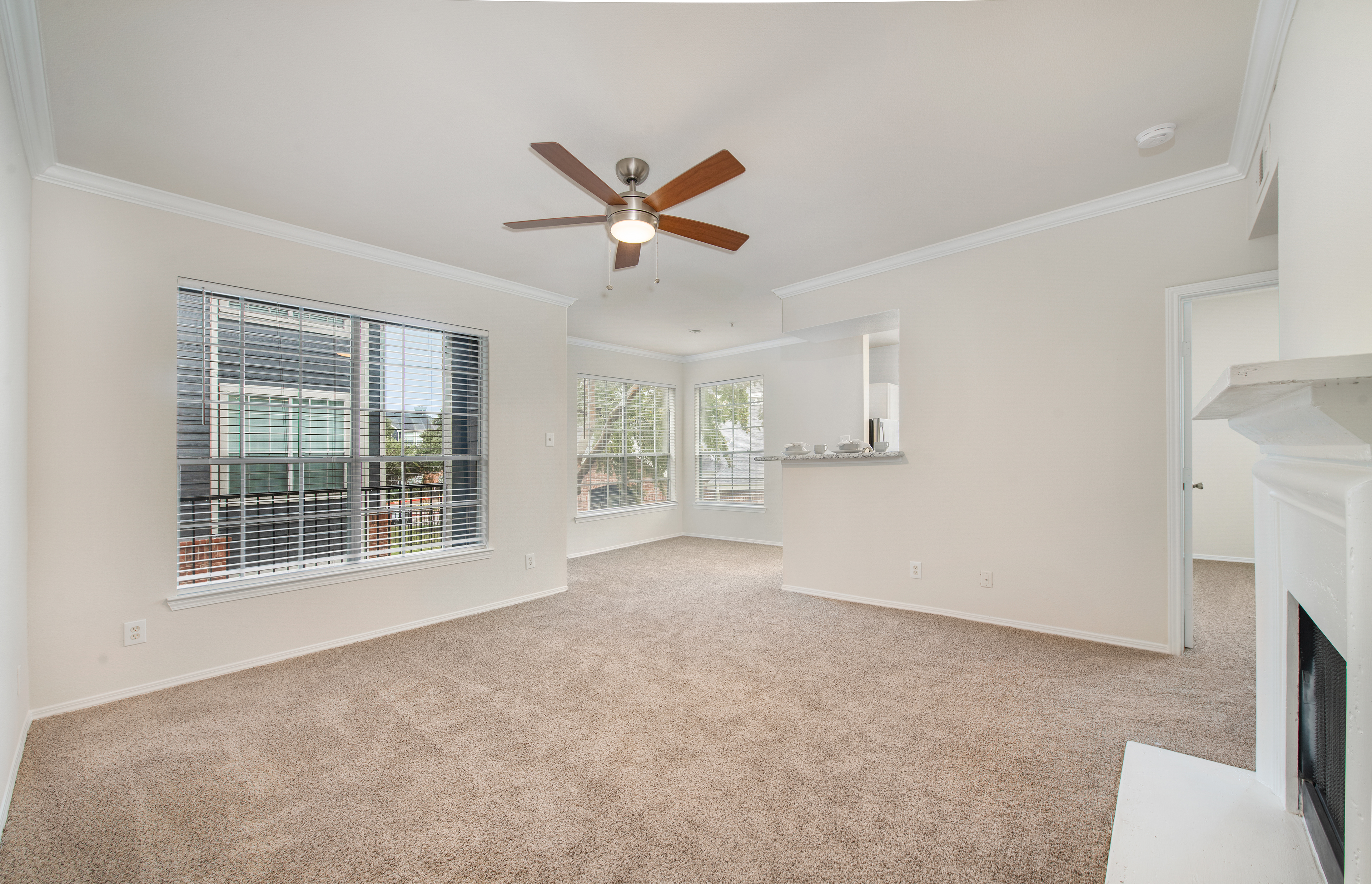 Living room at MAA Kirkwood luxury apartment homes in Stafford, TX
