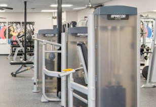 Close-up view of fitness center weight machines at MAA Midtown Square luxury apartments in Houston, TX