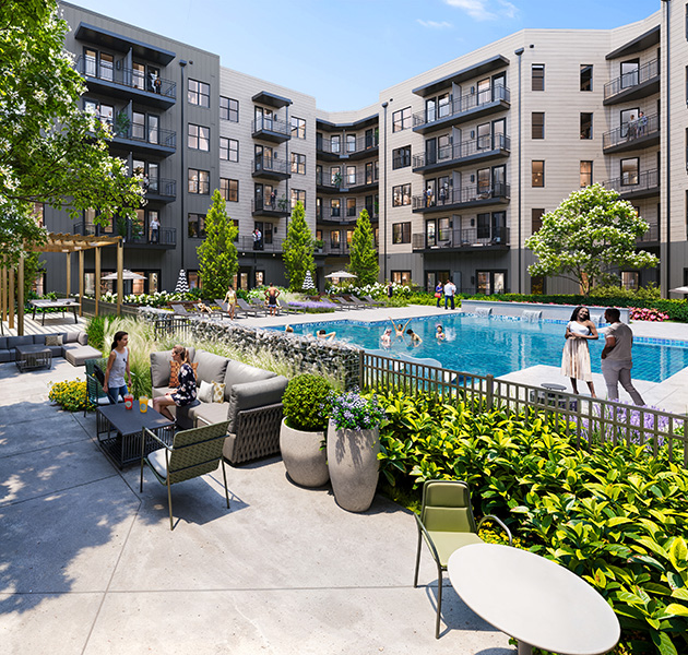 Outdoor community courtyard with a gated large swimming pool and landscaped greenery with patio seating surrounded by apartment buildings at MAA Rove luxury apartments in Richmond, VA