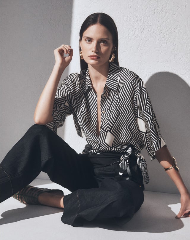 Man walking to a marooned boat