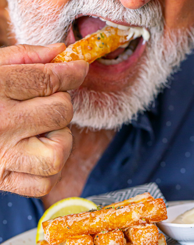 Man walking to a marooned boat