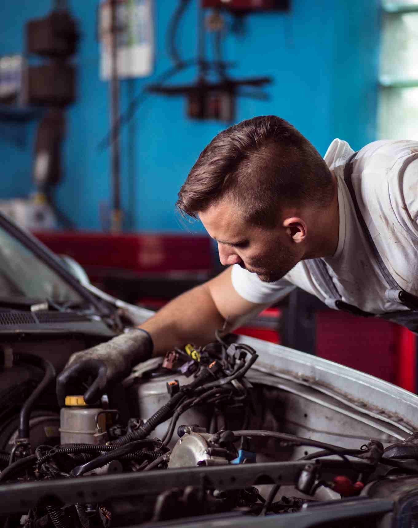 Man walking to a marooned boat