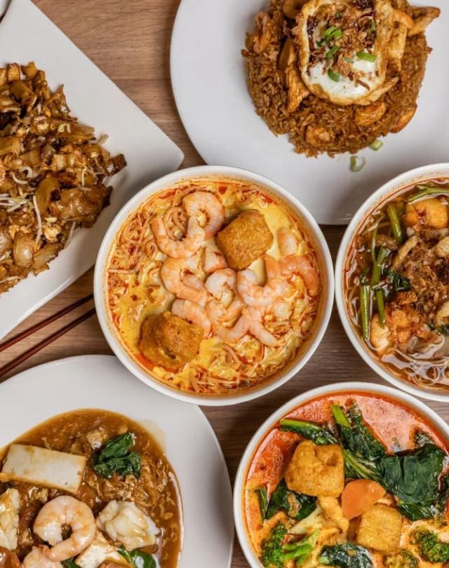 Man walking to a marooned boat