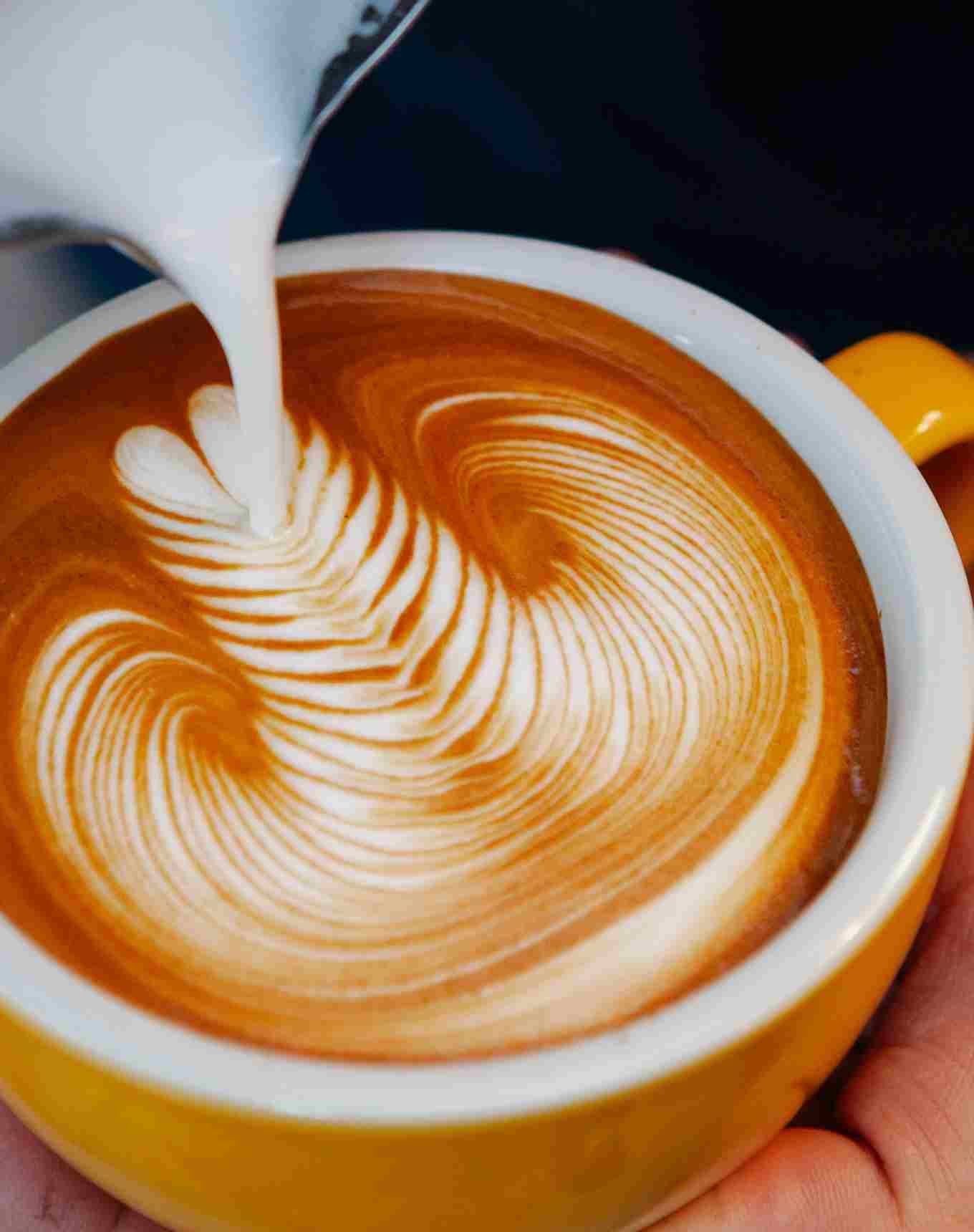 Man walking to a marooned boat