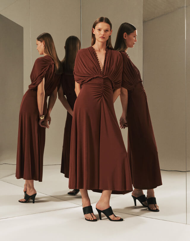 Man walking to a marooned boat