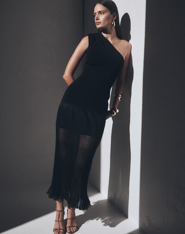 Man walking to a marooned boat