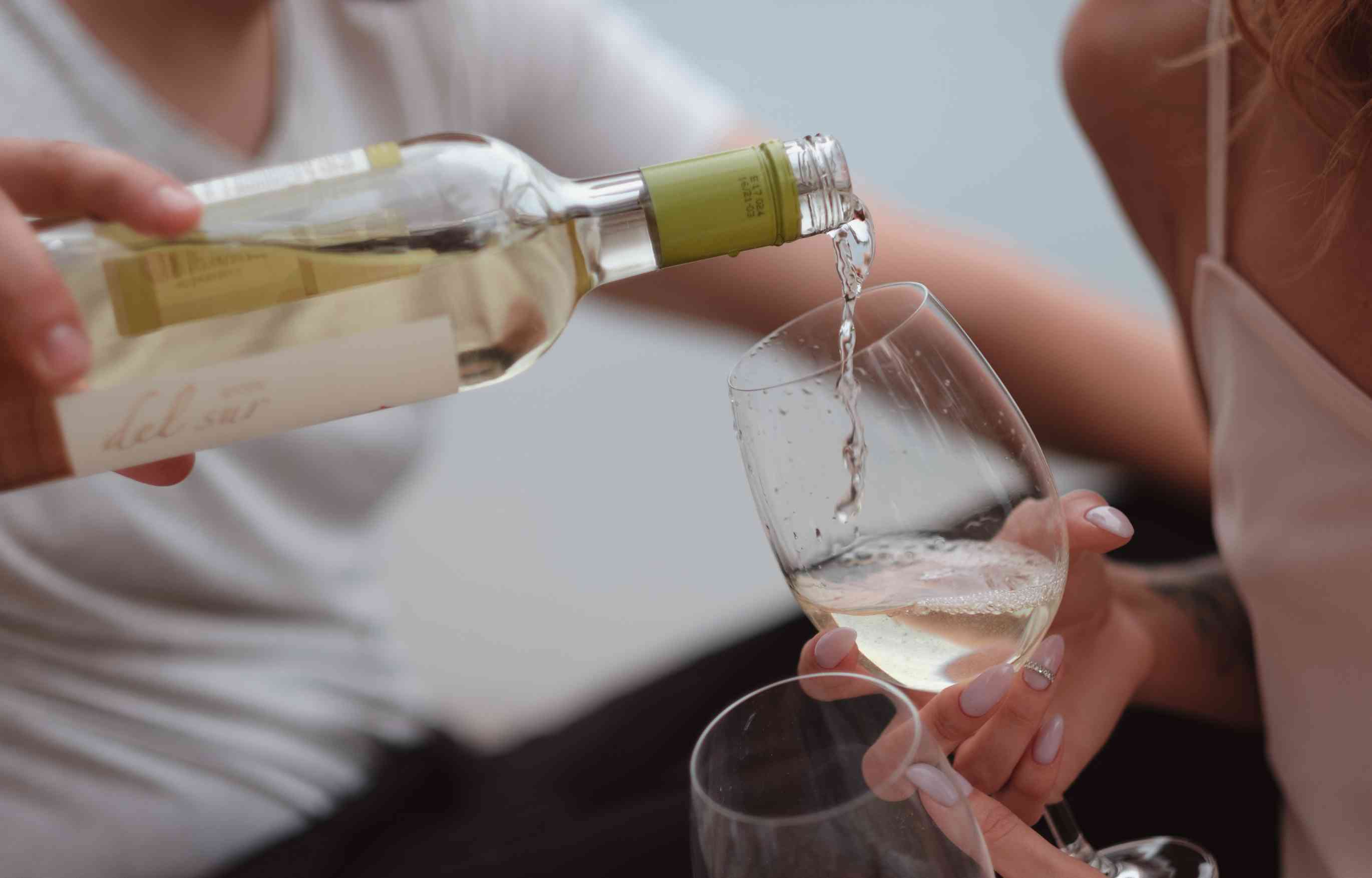 Pouring glass of wine