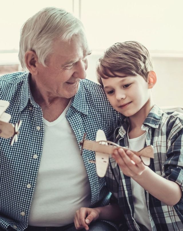 Man walking to a marooned boat