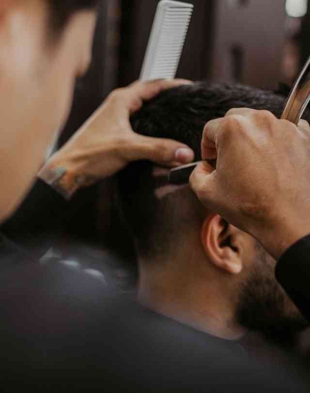 Man walking to a marooned boat