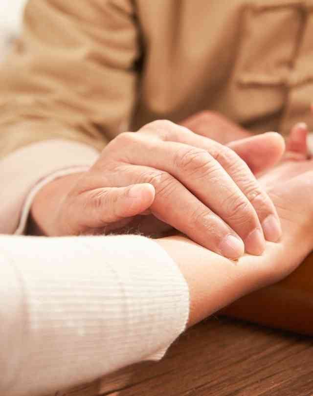 Man walking to a marooned boat
