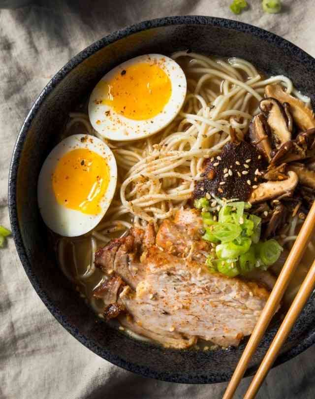 Man walking to a marooned boat