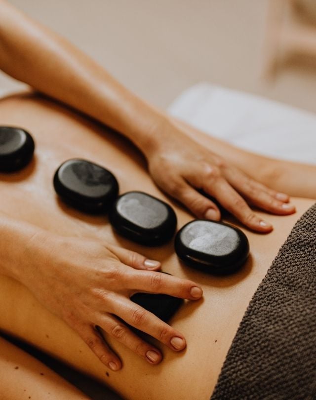 Man walking to a marooned boat