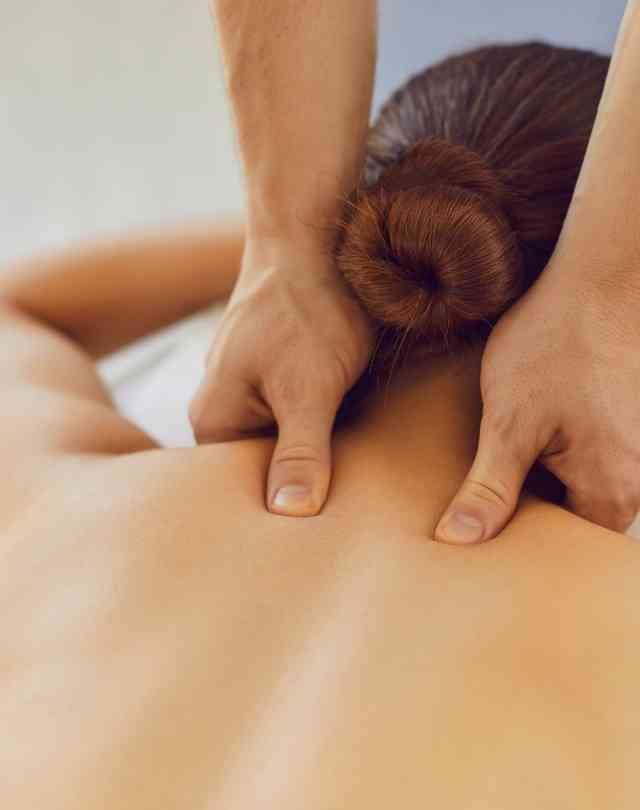 Man walking to a marooned boat