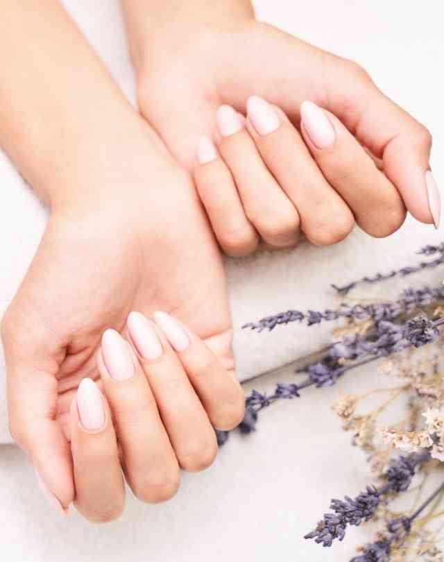 Man walking to a marooned boat