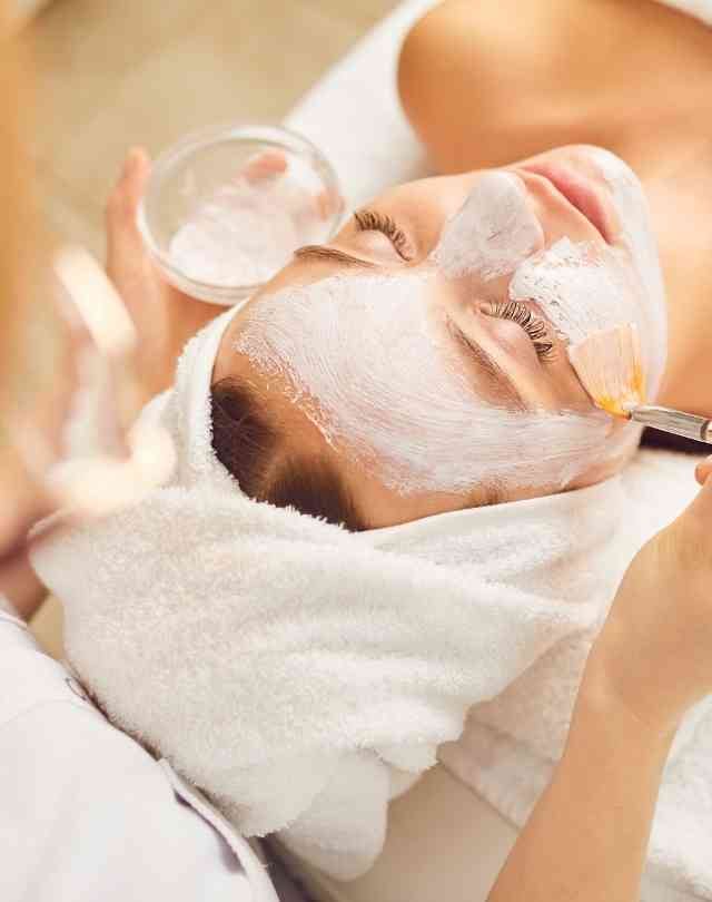 Man walking to a marooned boat