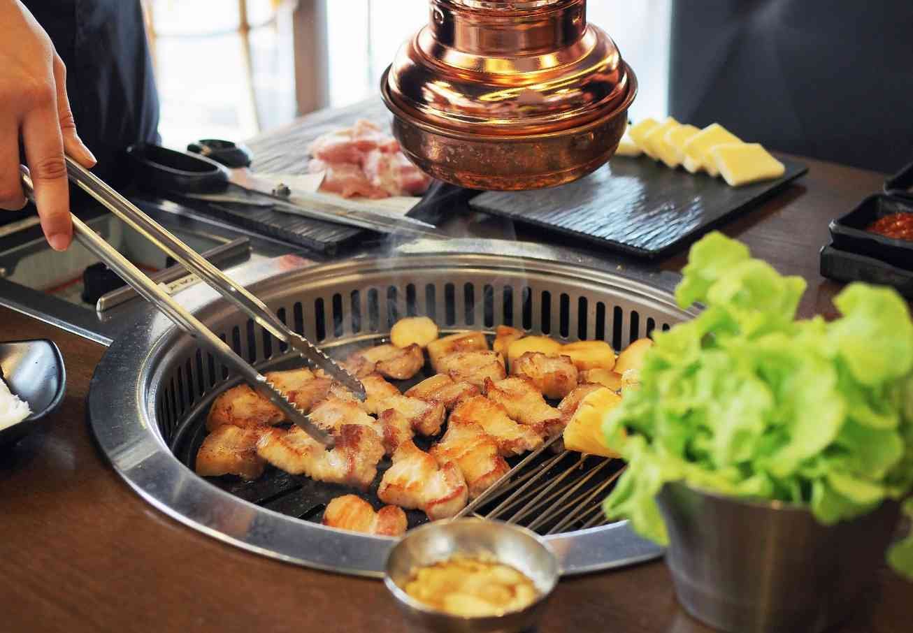 Man walking to a marooned boat