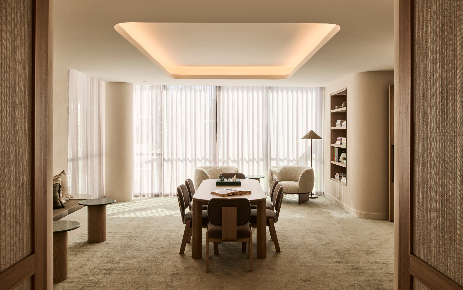 a room with a table and chairs
