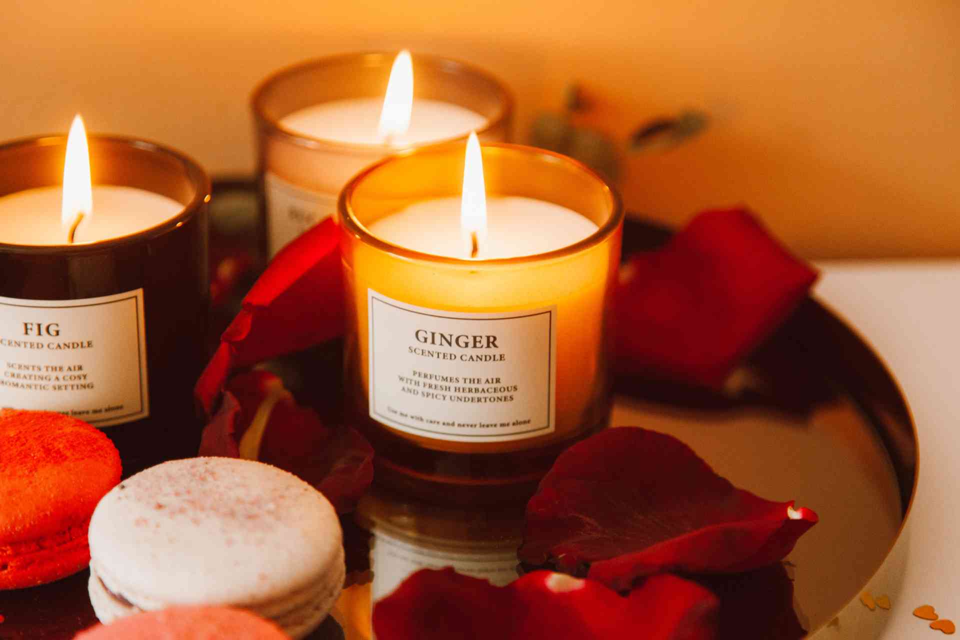 Lighted scented candles by the window