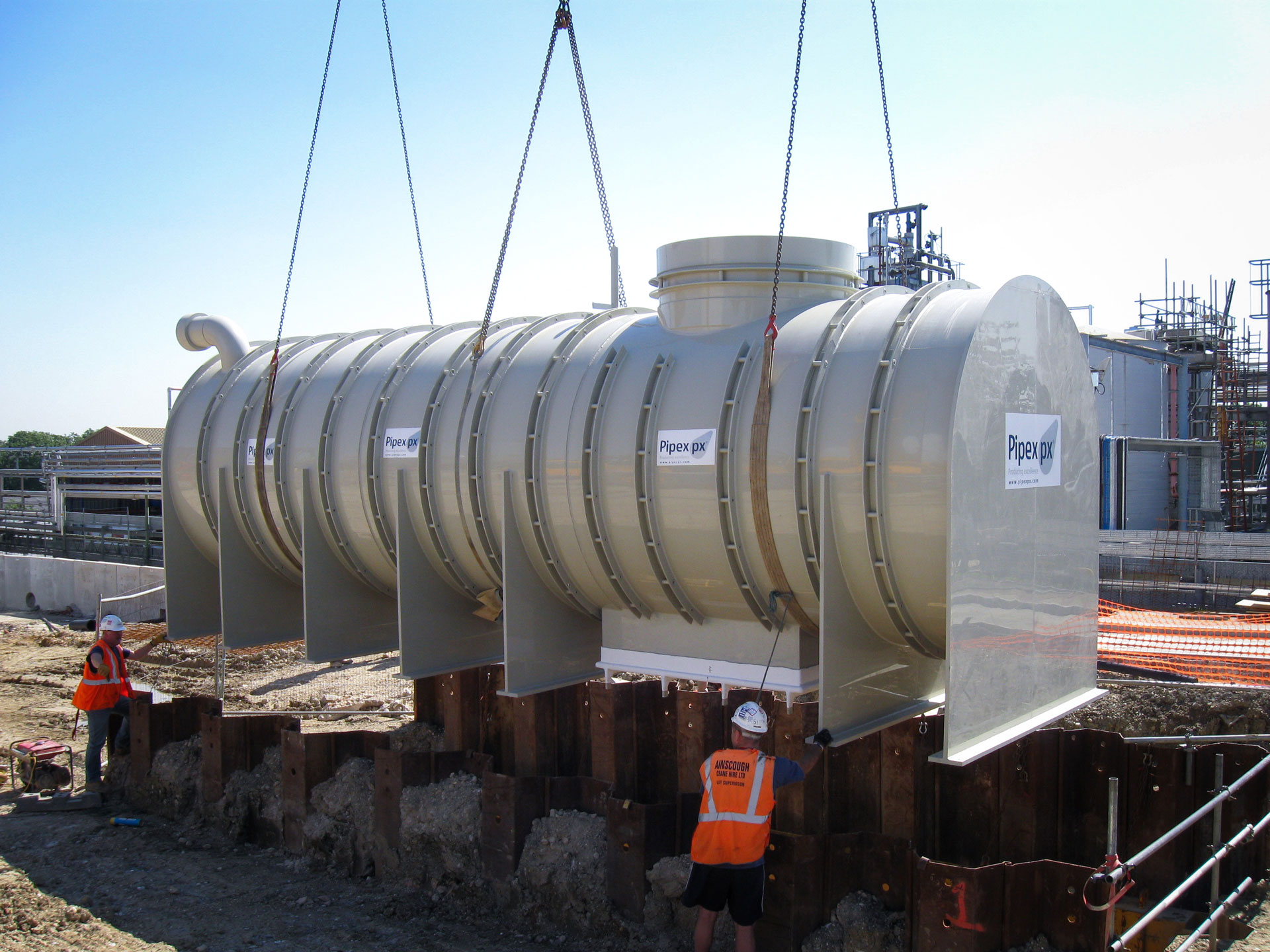 Pipex containment tank being installed underground onsite