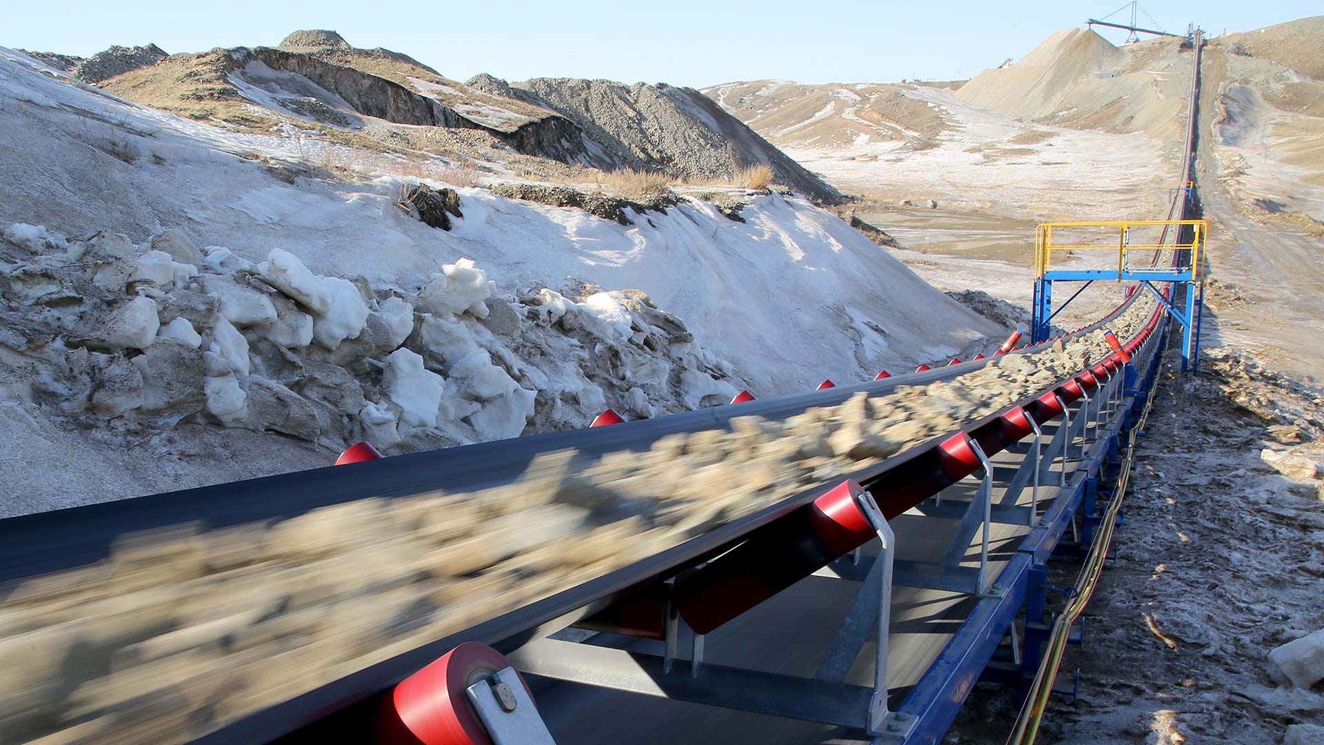 Industrial conveyor belt moves ore from a quarry 