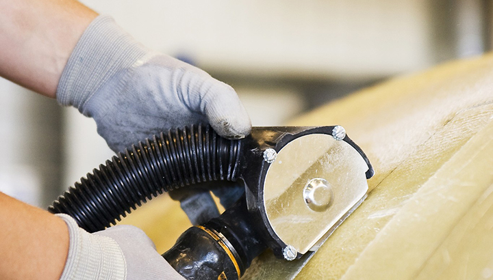 Dustless blasting composite machining
