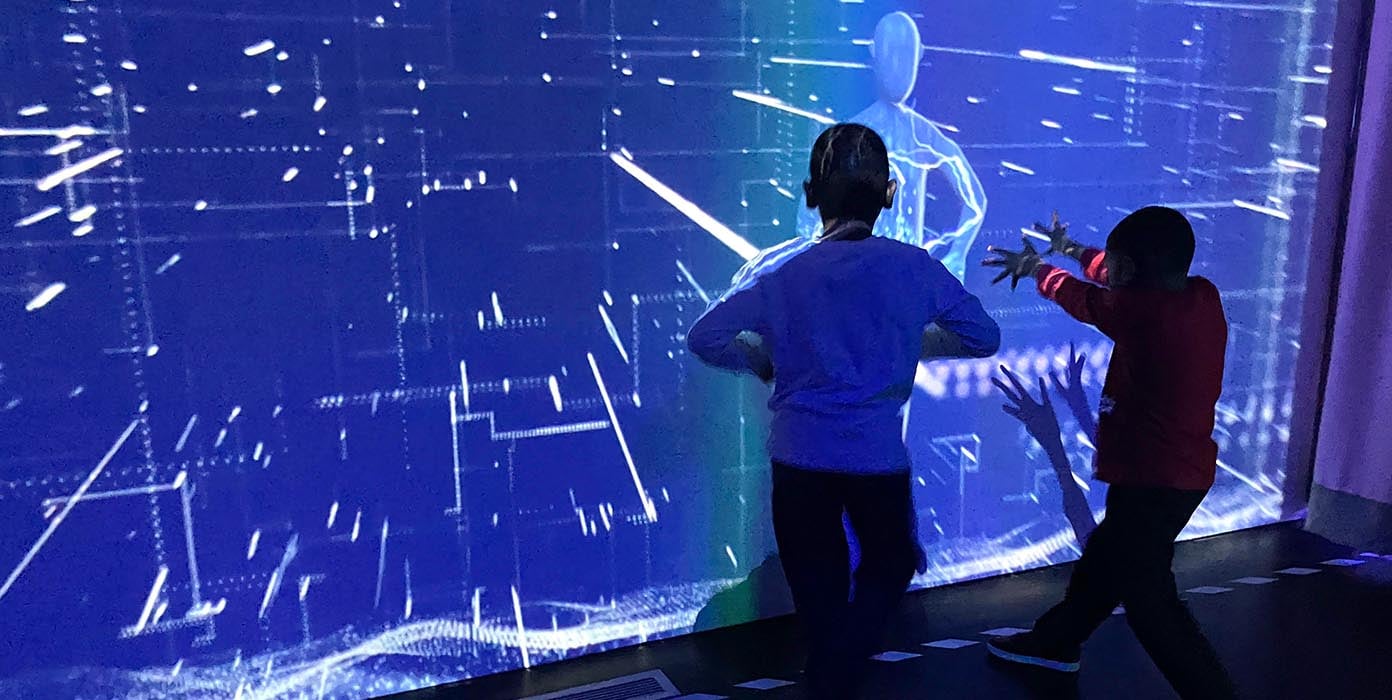 Two young boys exploring NYPA's Energy Zone