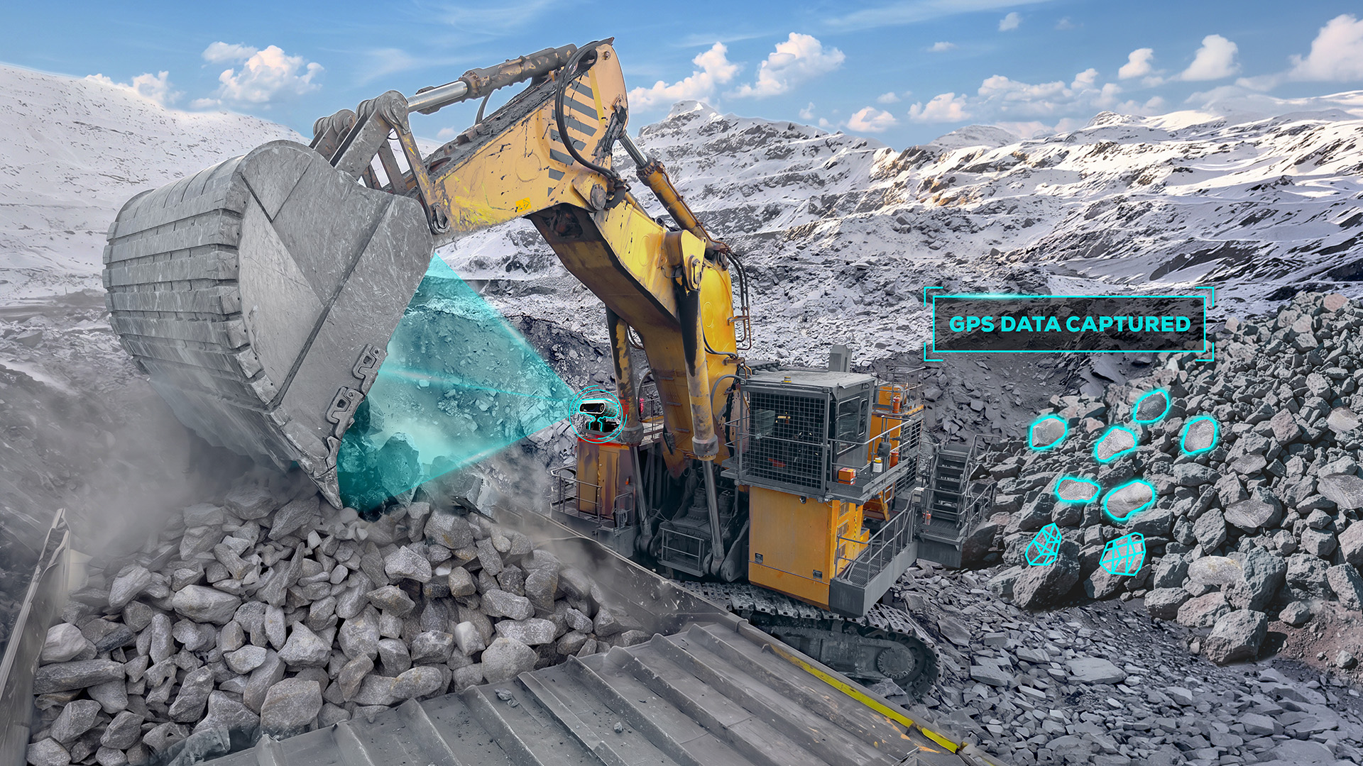 Excavator loading rocks into haul truck with FRAGTrack measurement being taken