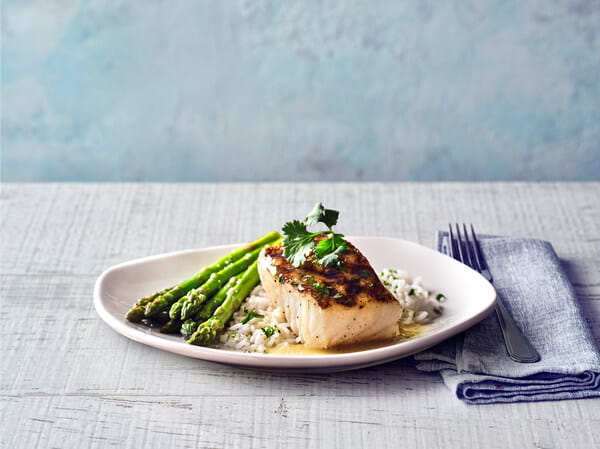 Parker’s Margarita Sea Bass is wood-grilled with chef-crafted tequila lime sauce, with jasmine rice and asparagus