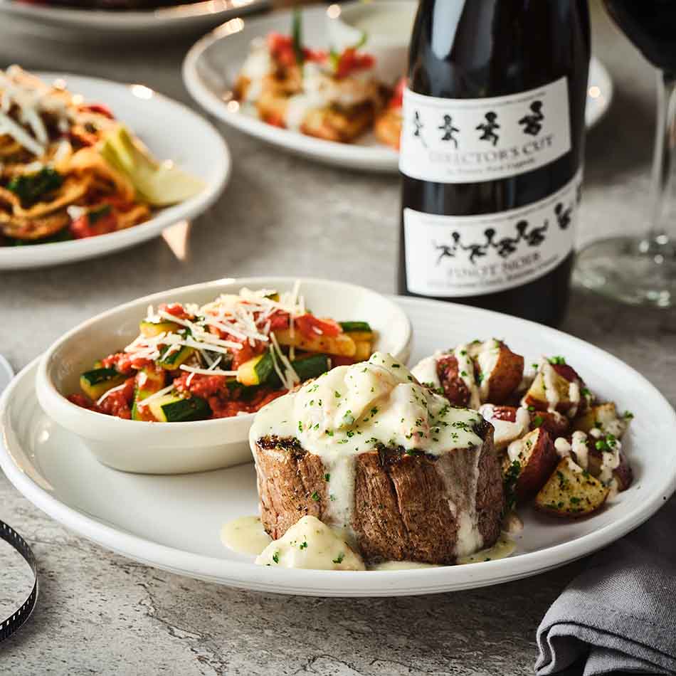 TUSCAN-GRILLED FILET WITH CRAB SCAMPI