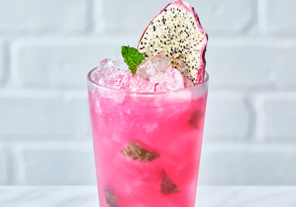 DRAGON FRUIT NO-JITO Dragon fruit, refreshing mint, and Fever-Tree Sparkling Lime Yuzu, offers a bright and bubbly tropical escape.