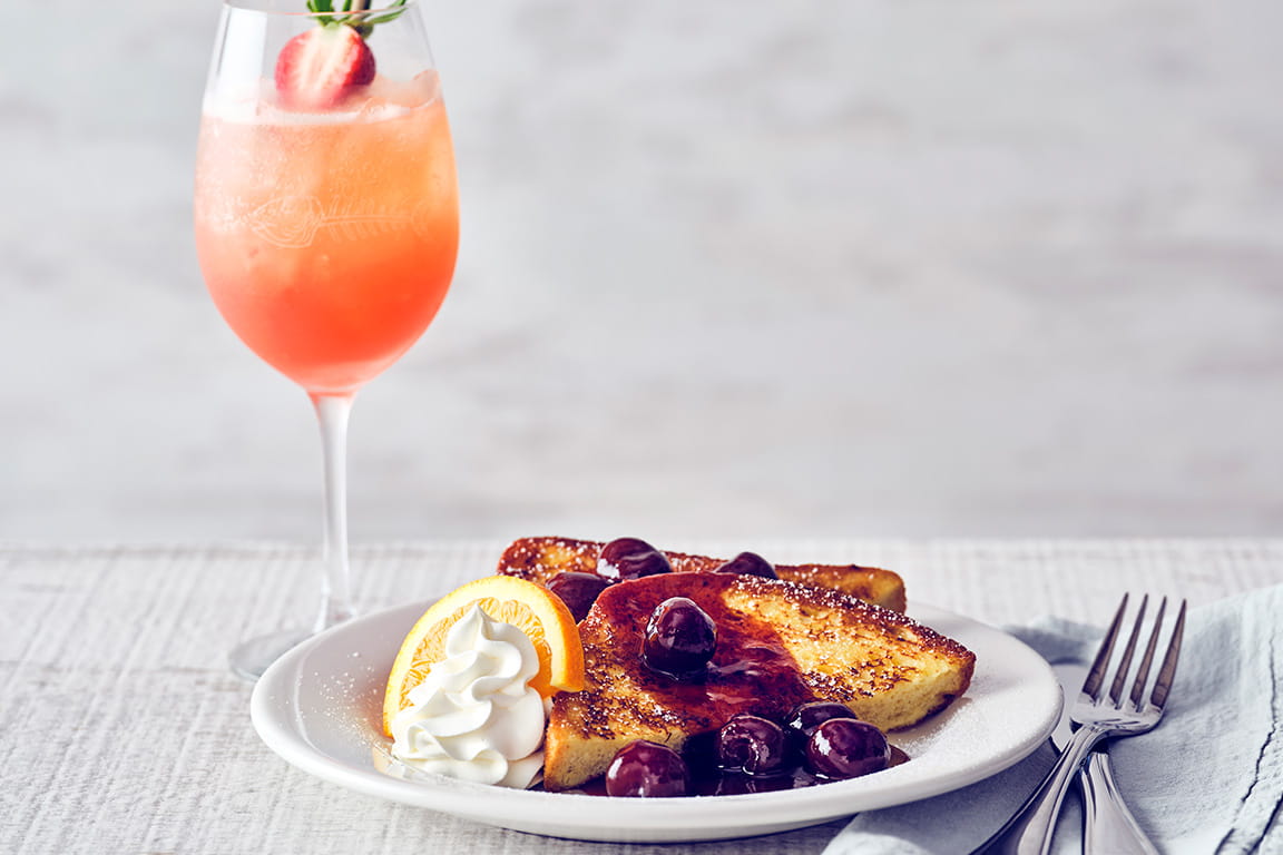 COURSE 3 CHERRY FRENCH TOAST Soaked brioche bread, topped with chef-crafted cherry sauce and whipped cream.  STRAWBERRY APEROL SPRITZ Tito’s Handmade vodka, Aperol, strawberry and lime topped with sparkling wine perfectly complement the Cherry French Toast’s warm brioche and sweet cherry sauce, combining refreshing flavors that keep each bite light and balanced.
