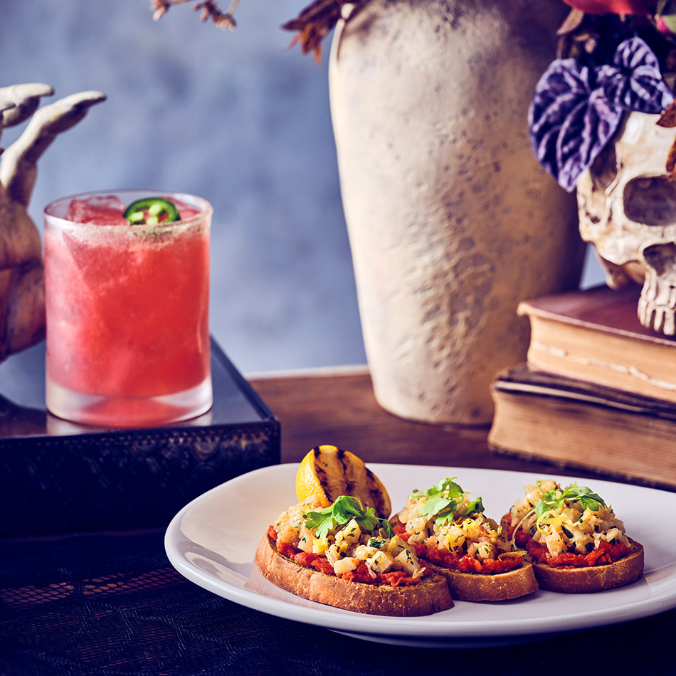 THE AWAKENING SUN-DRIED TOMATO SHRIMP CROSTINI A tempting first bite of toasted crostinis topped with roasted shrimp salad and sun-dried tomatoes, finished with micro celery and a charred lemon. DIABLO’S DREAM A devilishly sweet and spicy cocktail with Patrón Silver tequila, strawberry, habanero lime and house-made sour mix, garnished with a jalapeño sugar rim and fresh jalapeño. The sweet and spicy notes balance the savoriness of the roasted shrimp salad.