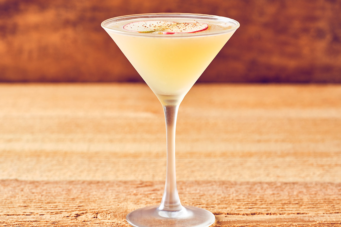 FRESH APPLE MARTINI FRÏS vodka is infused with apples and Domaine de Canton ginger liqueur, then finished with a touch of honey and a sprinkle of cinnamon.
