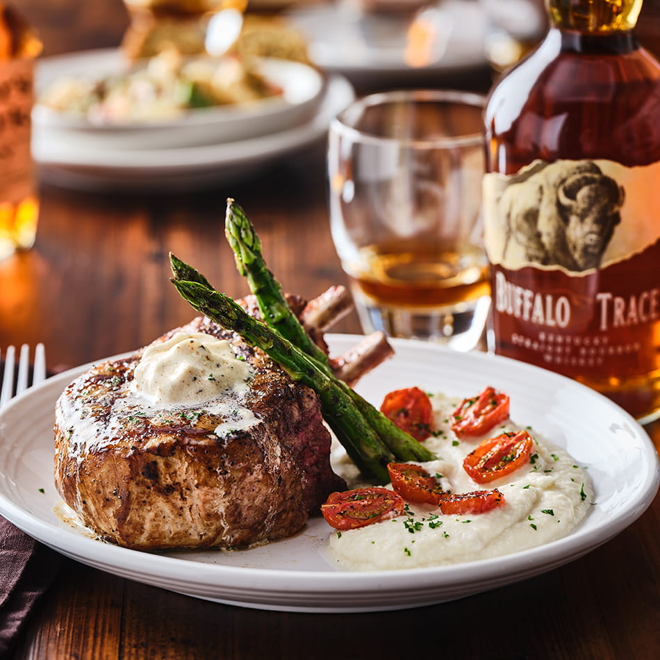 22oz Pork Chop with Sweet Bourbon Butter