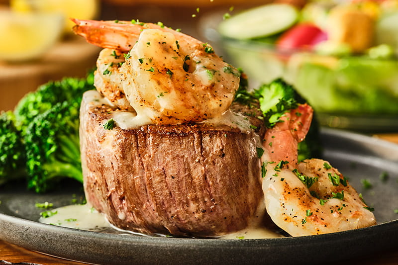 NEW FILET TOPPED WITH LEMON GARLIC SHRIMP