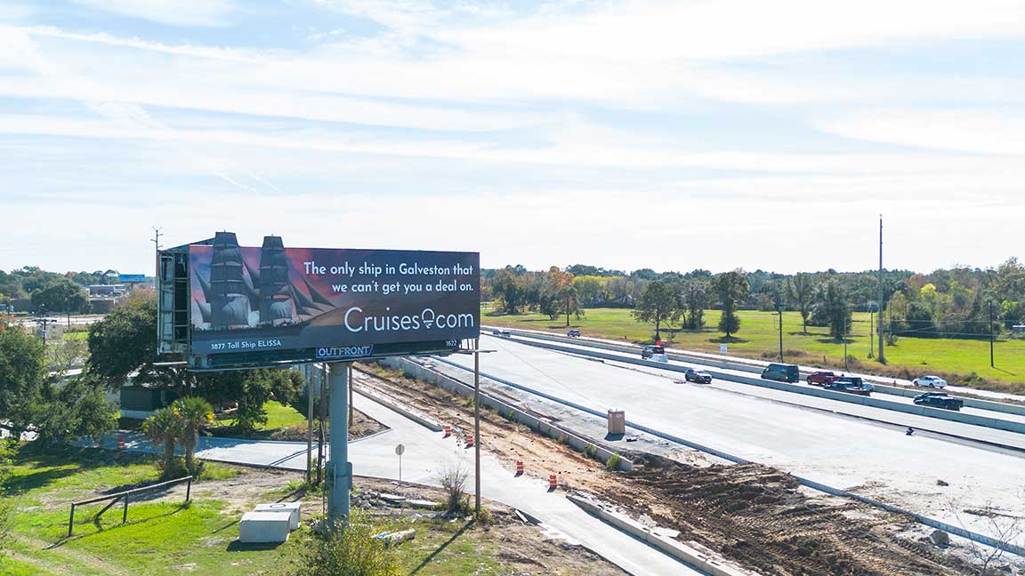 Cruises.com billboard on first side of interstate gateway