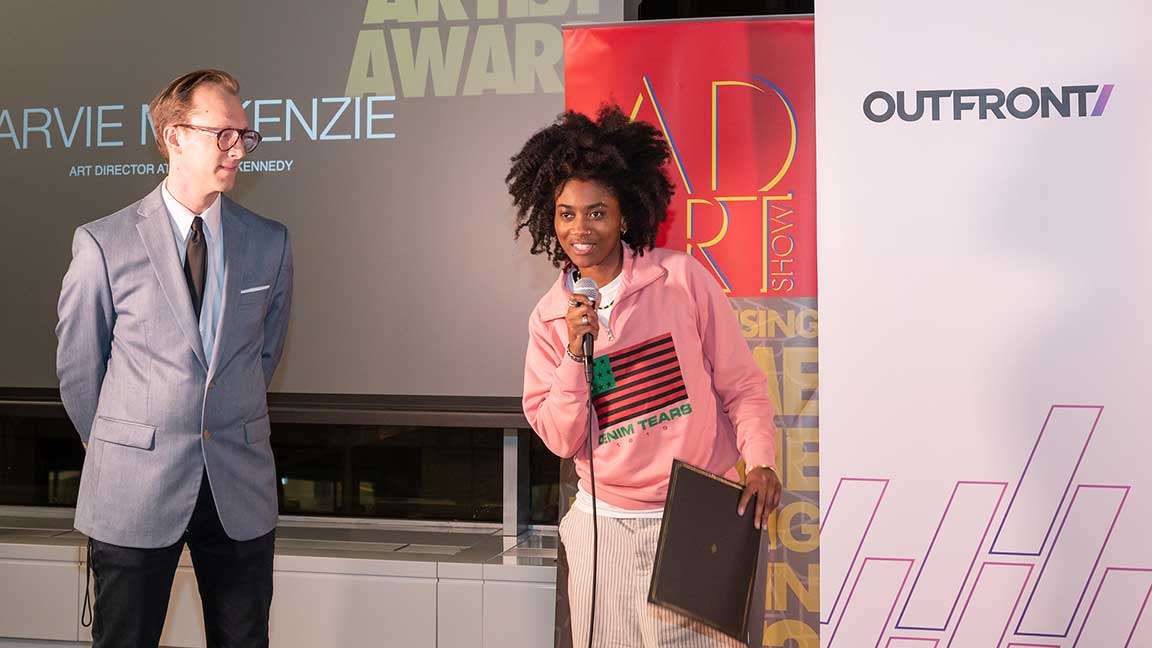 Arvie McKenzie accept the Rising Artist Award at the 2024 AD ART SHOW