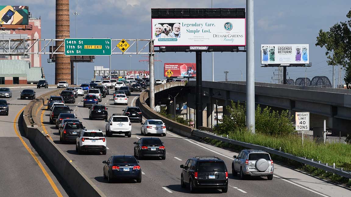 OUTFRONT bulletin billboards along St. Louis highway