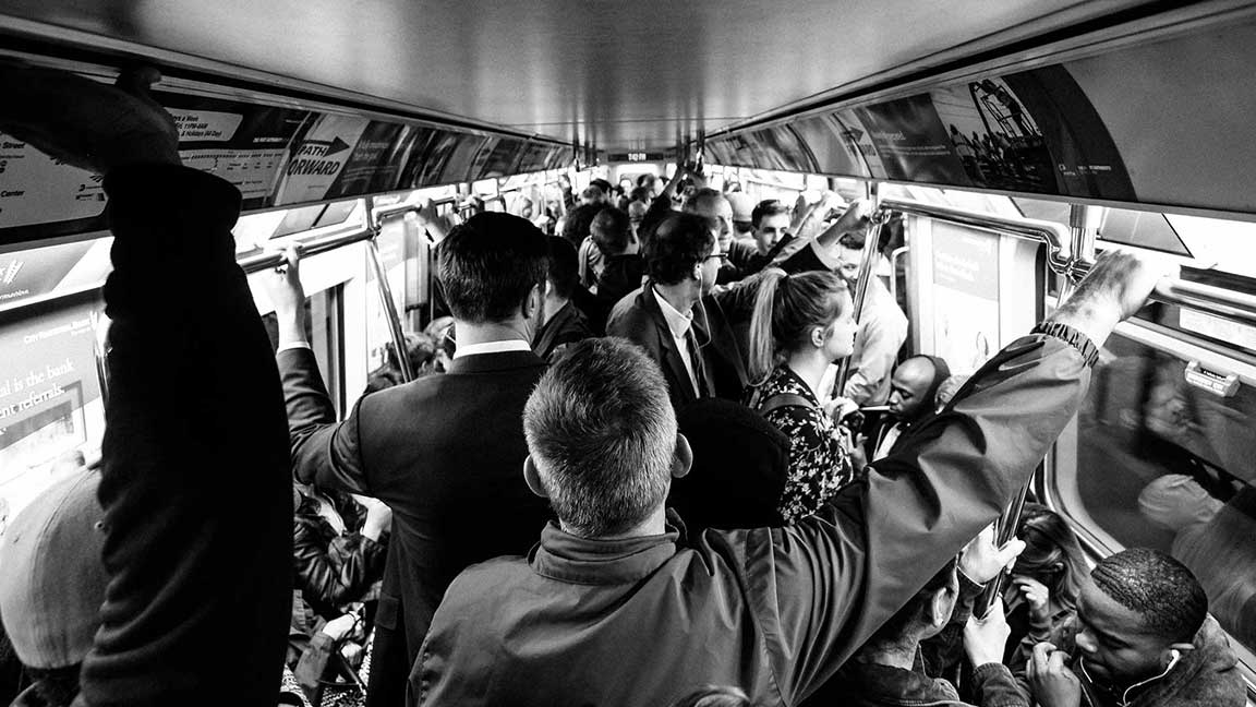 Straphangers on the NYC subway. Image by Getty Images