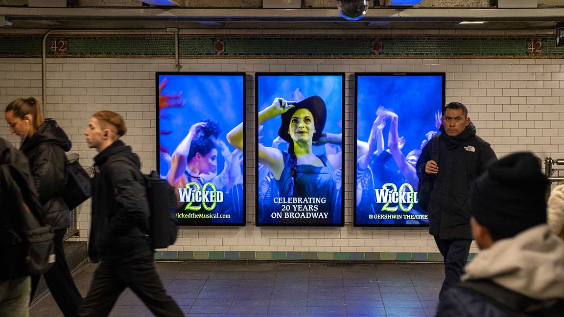 Ad for Wicked on Broadway on live board triptych