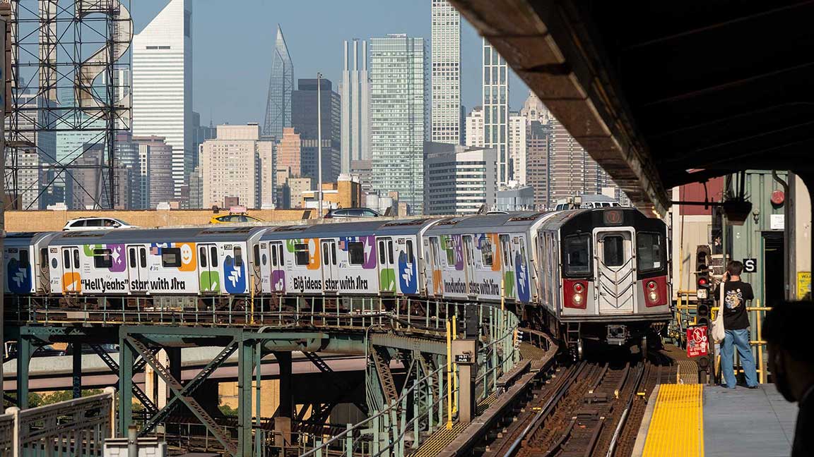 Wrapped 7 line subway train from Atlassian, today