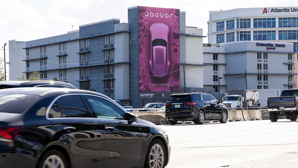 Jaguar OOH advertisement on Miami wallscape during Art Basel 