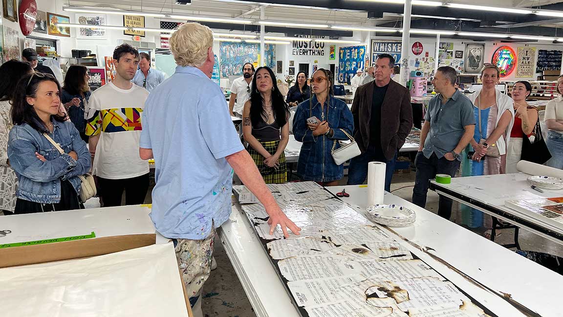 OUTFRONT clients tour Peter Tunney’s studio in Miami during Art Basel