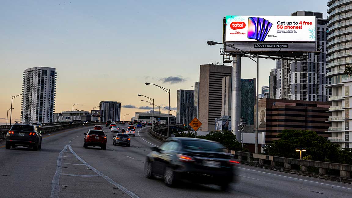 OUTFRONT PRIME digital billboard in Miami with Total by Verizon ad promoting special offer