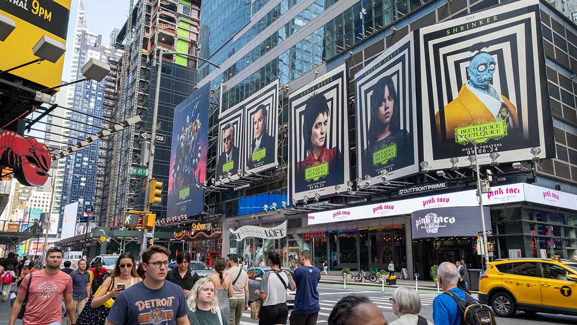 Traditional static billboard ad for Beetlejuice Beetlejuice on Times Square Tower