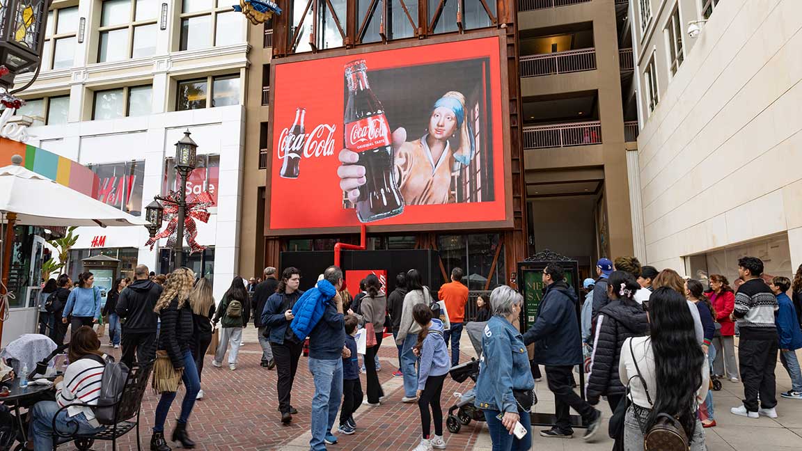 Coca-Cola campaign featuring Girl with a Pearl Earring at brand activation at The Americana at Brand