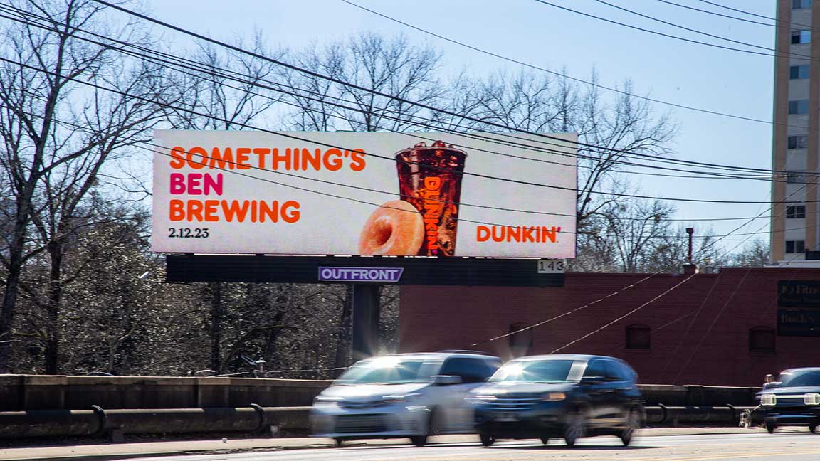 Dunkin billboard says Something's Ben Brewing