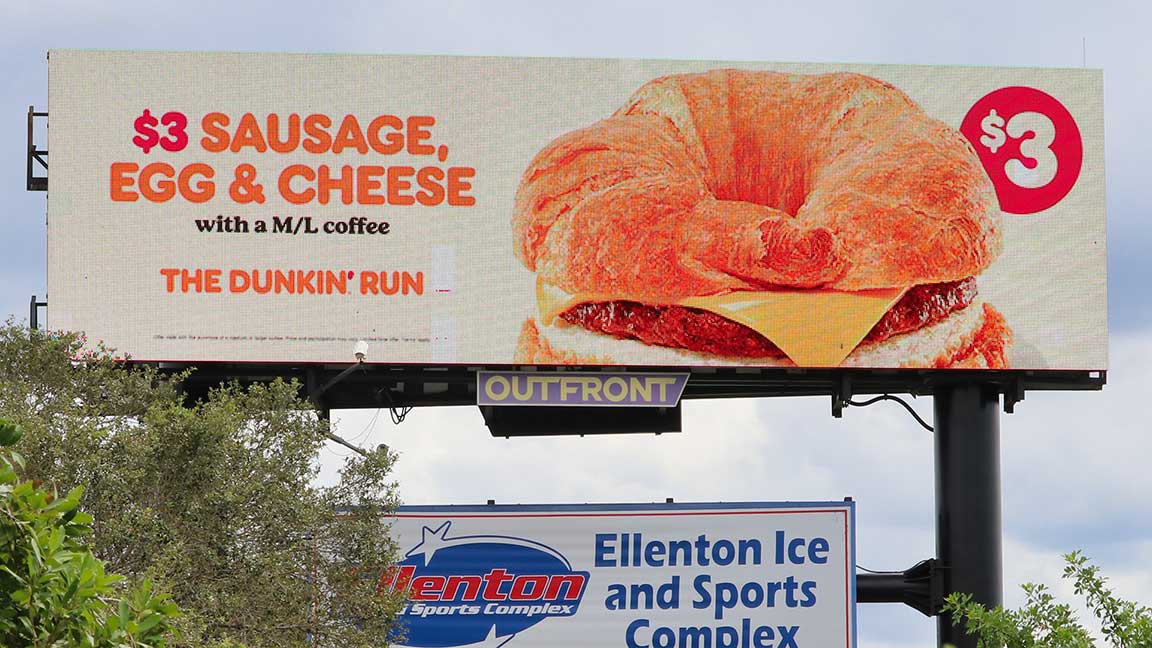 Dunkin billboard advertising breakfast sandwich deal