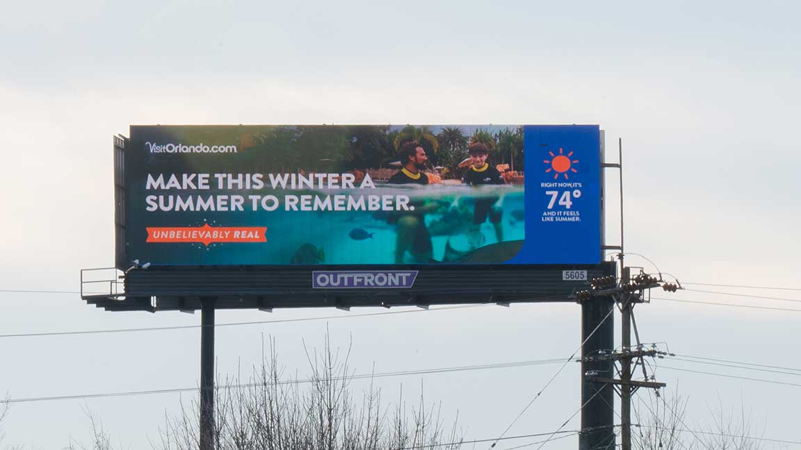 Visit Orlando billboard with live temperature
