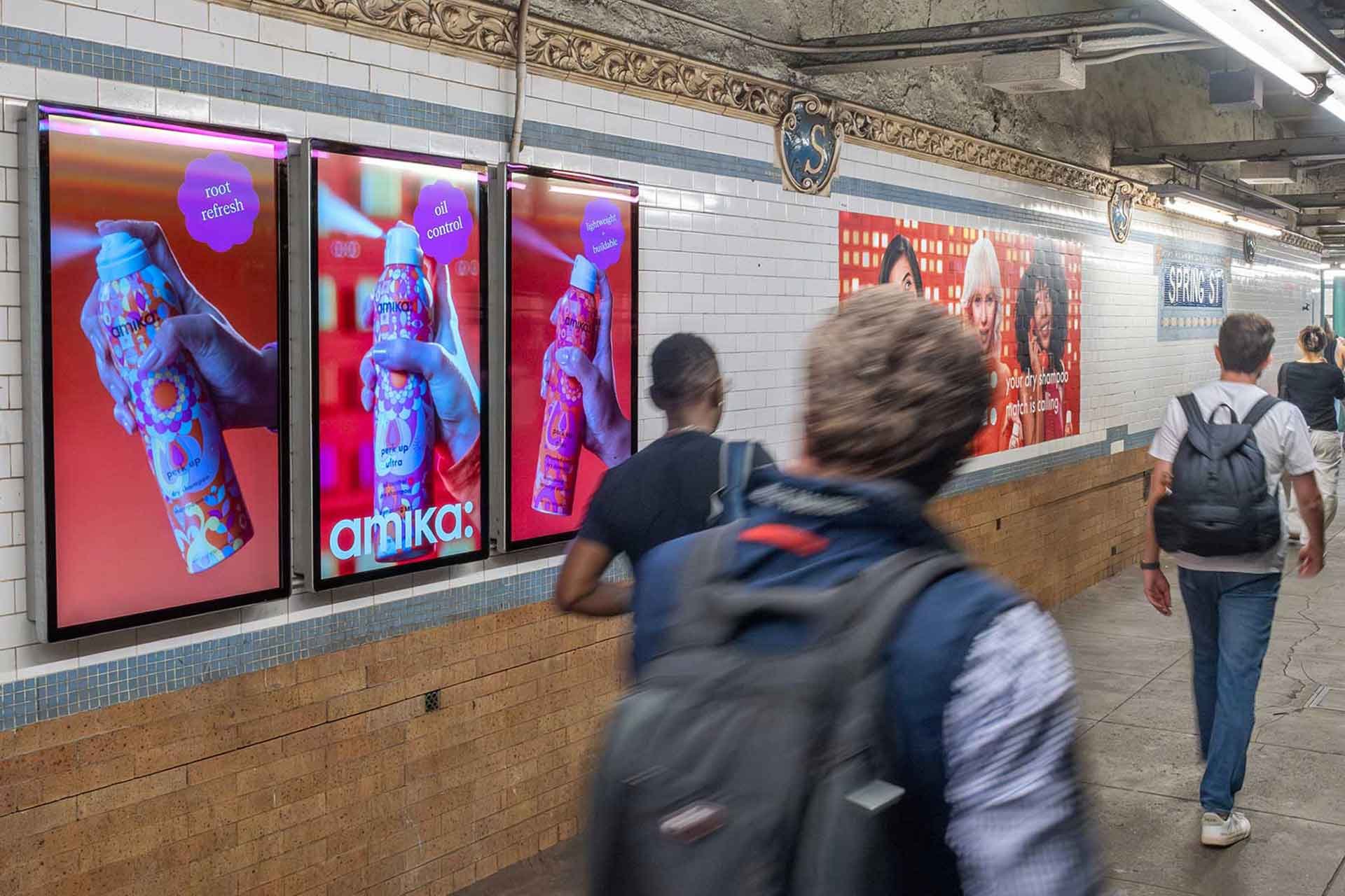 amika campaign on Digital Liveboards and posters in New York City subway station